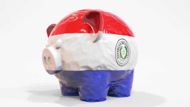 Deflating o banco inflável do porquinho com bandeira impressa de Paraguai. Crise financeira paraguaia relacionado animação 3D conceitual — Vídeo de Stock