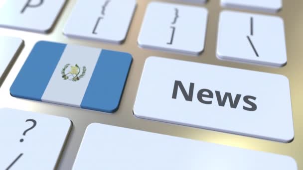 Nieuwsbericht en vlag van Guatemala op de toetsen van een toetsenbord. Nationale online media gerelateerde conceptuele 3D animatie — Stockvideo