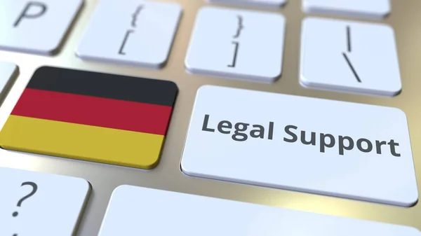Rechtshilfetext und Flagge der Bundesrepublik Deutschland auf der Computertastatur. 3D-Rendering für Online-Rechtsberatung — Stockfoto