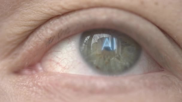 AI of kunstmatige intelligentie tekst op het menselijk oog. Moderne technologie gerelateerde macro shot — Stockvideo