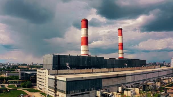 Aerial view of a power plant on cloudy sky background — Stock Video