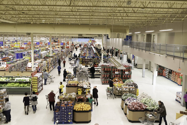 November 30 2019 - Calgary, Alberta, Canada - Shoppers in a Superstore during the Black Friday, Cyber monday weekend
