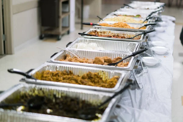 buffet of Nigerian food served at celebration