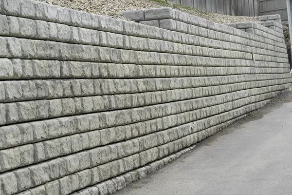 Retaining wall in residential area to protect against erosion — Stok fotoğraf