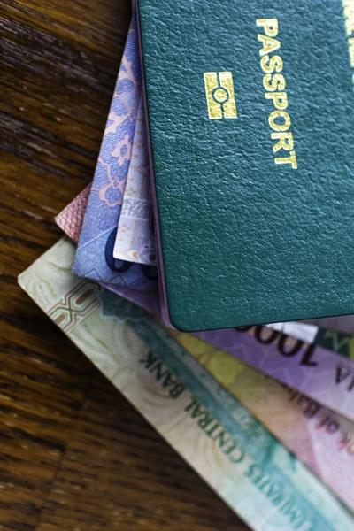 Nigerian Passport with various currencies — Stock Photo, Image