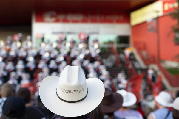 White Stetson Cowboy hat with music band in background — Stock Photo, Image
