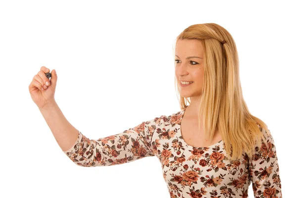 Linda mujer rubia escribiendo en tablero transparente en blanco con una marca — Foto de Stock