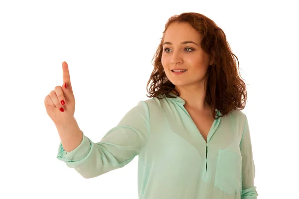 Business woman pointing to copy space while presenting a product — Stock Photo, Image