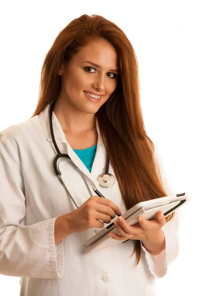 Soins de santé et médecine - jeune femme médecin isolée sur whit — Photo