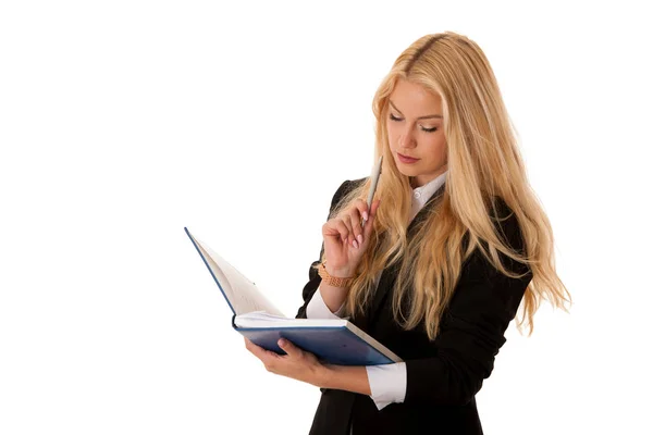 Mujer de negocios escribiendo notas en su cuaderno aislado sobre blanco — Foto de Stock