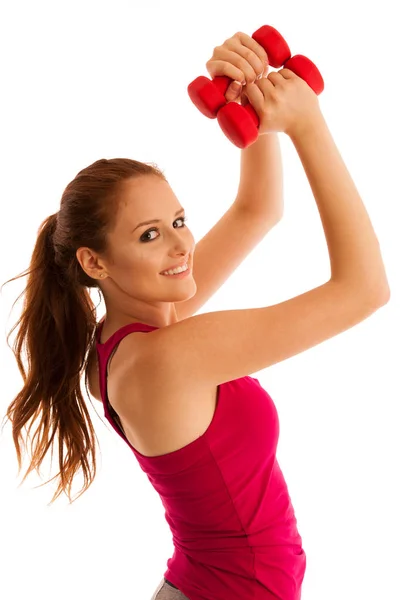 Fitness gym - woman works out with dumbbells isolated over white — Stock Photo, Image