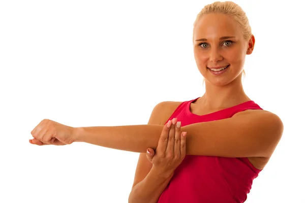 Fit woman stretch arm  isolated over white — Stock Photo, Image