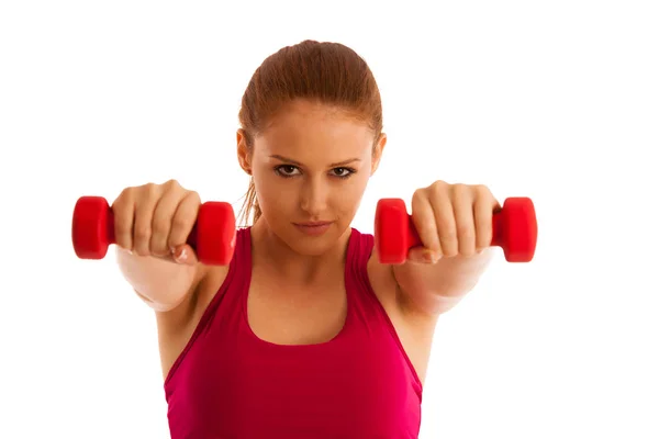 Gimnasio fitness - mujer hace ejercicio con pesas aisladas sobre blanco — Foto de Stock