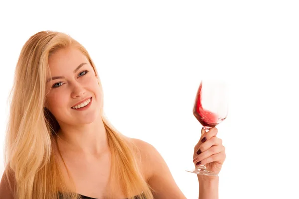 Cute blonde woman drinks a glass of red wine isolated over white — Stock Photo, Image