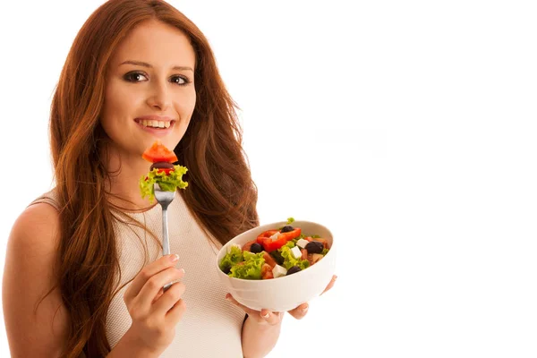Alimentación saludable - mujer come un tazón de ensalada griega aislado sobre — Foto de Stock