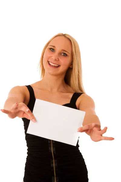 Cute blond woman with blank white banner in her hands smiling is — Stock Photo, Image