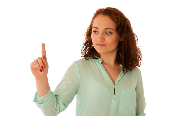 Business woman pointing to copy space while presenting a product — Stock Photo, Image