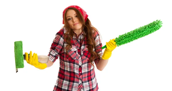 Uncertain woman cleaning isolated over white background — Stock Photo, Image