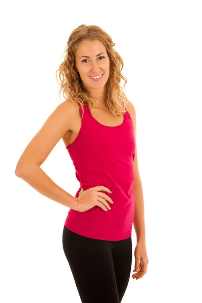 Cute young blond woman working out in fitness gym isolated over — Stock Photo, Image