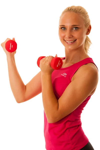 Estilo de vida saludable éxito deportivo - ajuste rubio entrenamiento de la mujer con d —  Fotos de Stock