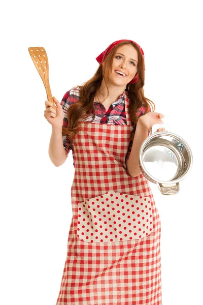 Young woman cooking isolated holding wooden spatula and a pot — Stock Photo, Image