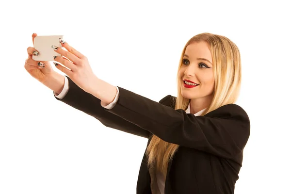 Beautiful business woman taking selfie photo with smart phone is — Stock Photo, Image