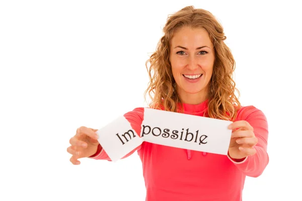 Woman tearing a paper with impossible script isolate over white — Stock Photo, Image