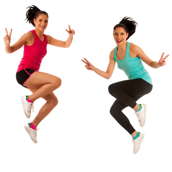 Mujer activa haciendo aeróbicos para un entrenamiento cardiovascular bailando — Foto de Stock