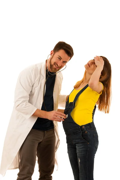 Happy couple - man listening to pregnant woman belly — Stock Photo, Image