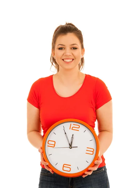 Cute woman holding a clock as a simbol of time management — Stock Photo, Image