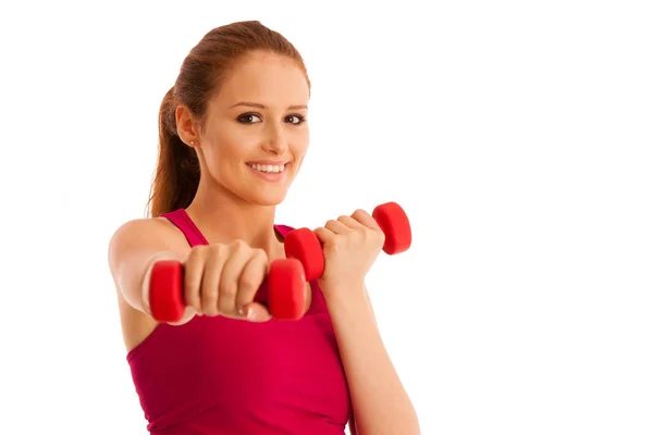 Fitness gym - woman works out with dumbbells isolated over white — Stock Photo, Image