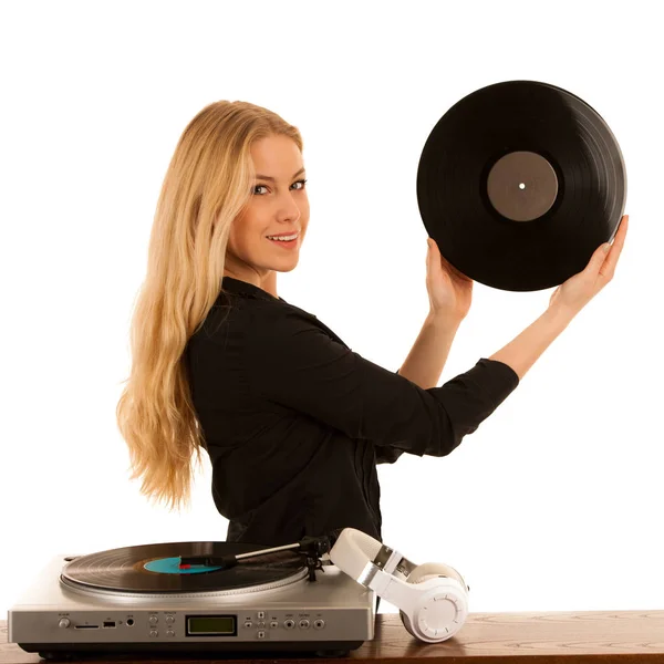 Kobieta, słuchania muzyki na Gramofon z winylu w jej ręce isol — Zdjęcie stockowe