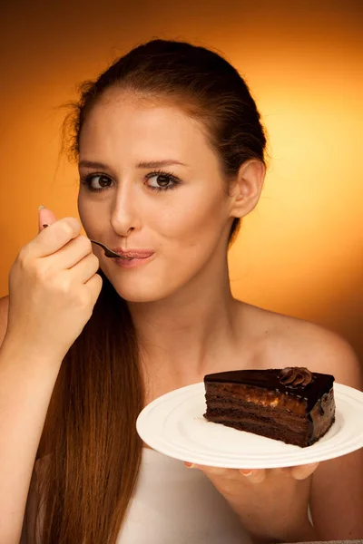Chocolate cake - glamorous woman eats dessert — Stock Photo, Image