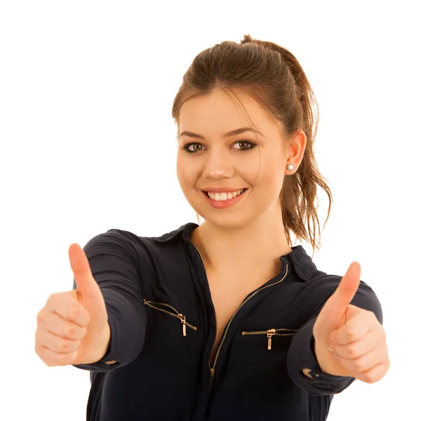 Красивая молодая женщина показывает большой палец вверх в качестве жеста для успеха — стоковое фото