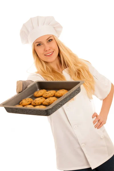Krásná blonďatá žena v šatech šéfkuchař peče cukroví, samostatný nad — Stock fotografie