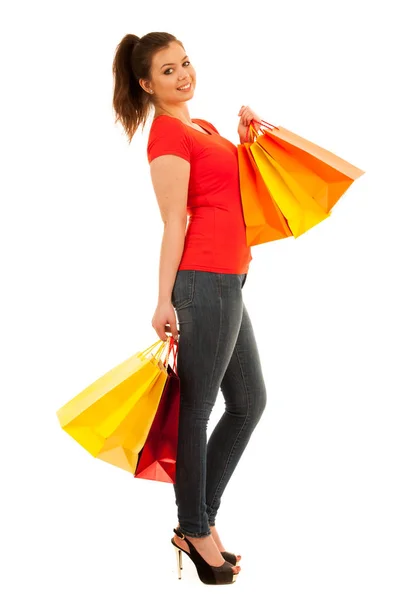 Volle lengte foto van vrouw met boodschappentassen geïsoleerd over w — Stockfoto