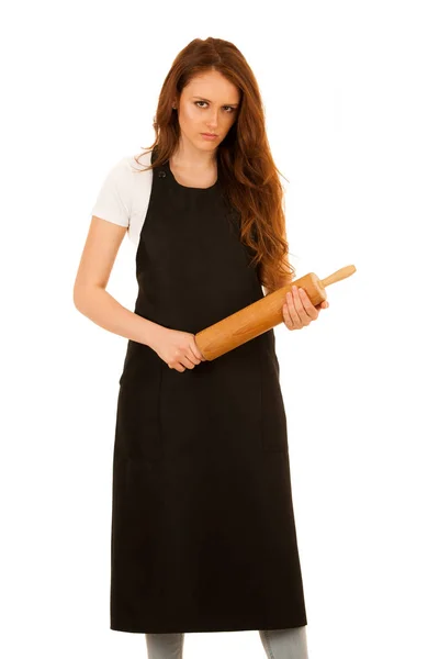 Hermosa panadera mujer sosteniendo un rodillo aislado sobre respaldo blanco —  Fotos de Stock