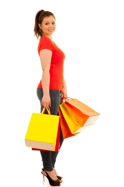 Повна довга фотографія жінки, що тримає сумки для покупок ізольовані над w — стокове фото