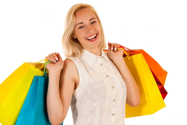 Jovem loira atraente com sacos de compras isolados — Fotografia de Stock