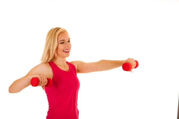 Active sporty woman works out with dumbbells isolated over white — Stock Photo, Image