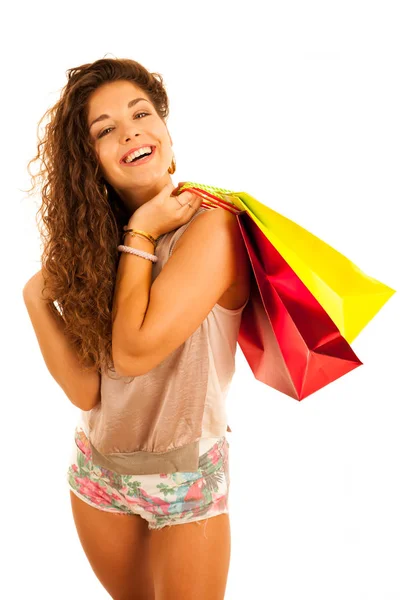 Ελκυστική νεαρή γυναίκα Καυκάσιος με τσάντες αγορών απομονωμένη ΟΒΕ — Φωτογραφία Αρχείου