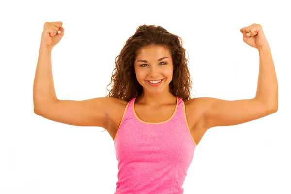 Activa joven deportista en forma mujer gesto de poder con sus brazos hacia arriba iso —  Fotos de Stock