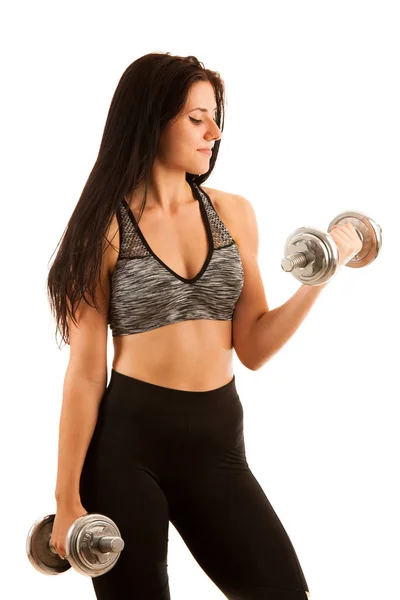 Aktif genç kadın egzersiz dumbbells ile — Stok fotoğraf