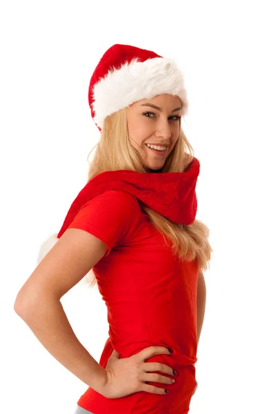 Niedliche blonde Frau mit Weihnachtsmütze siolated über weißem Hintergrund — Stockfoto