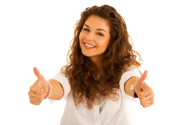 Attraente giovane donna felice gesticolando successo mostrando pollice in su — Foto Stock