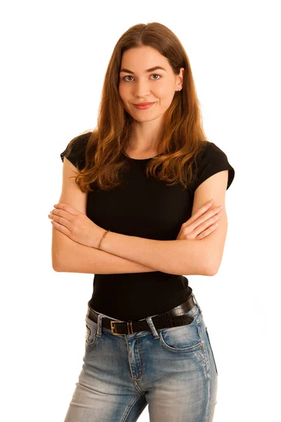 Atractiva mujer joven en jeans y camiseta negra aislada sobre — Foto de Stock