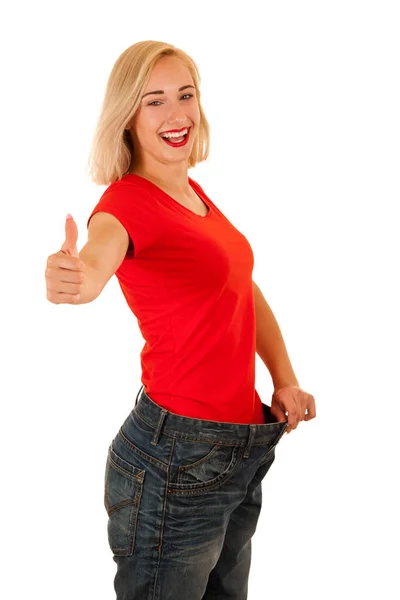 Attiva giovane donna gesto perdita di peso isolato su schienale bianco — Foto Stock