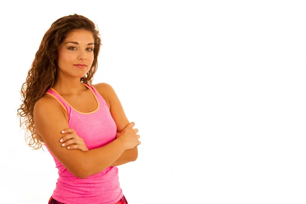 Jeune femme active avec les bras croisés isolé sur fond blanc — Photo