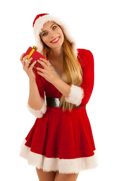 Hermosa joven en santa claus vestido hods un regalo isolat — Foto de Stock