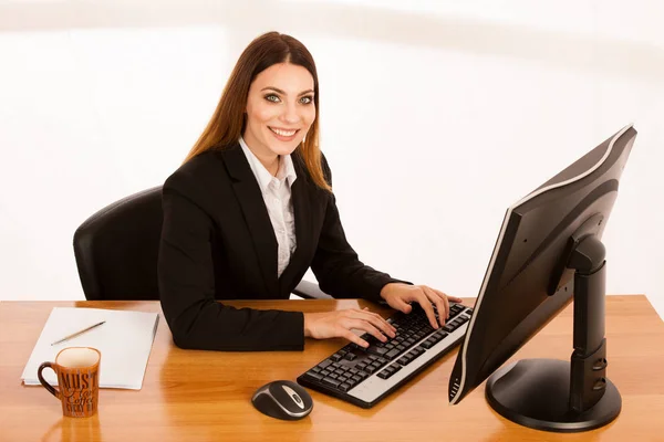High perspective view of business woman working in office — Stock Photo, Image